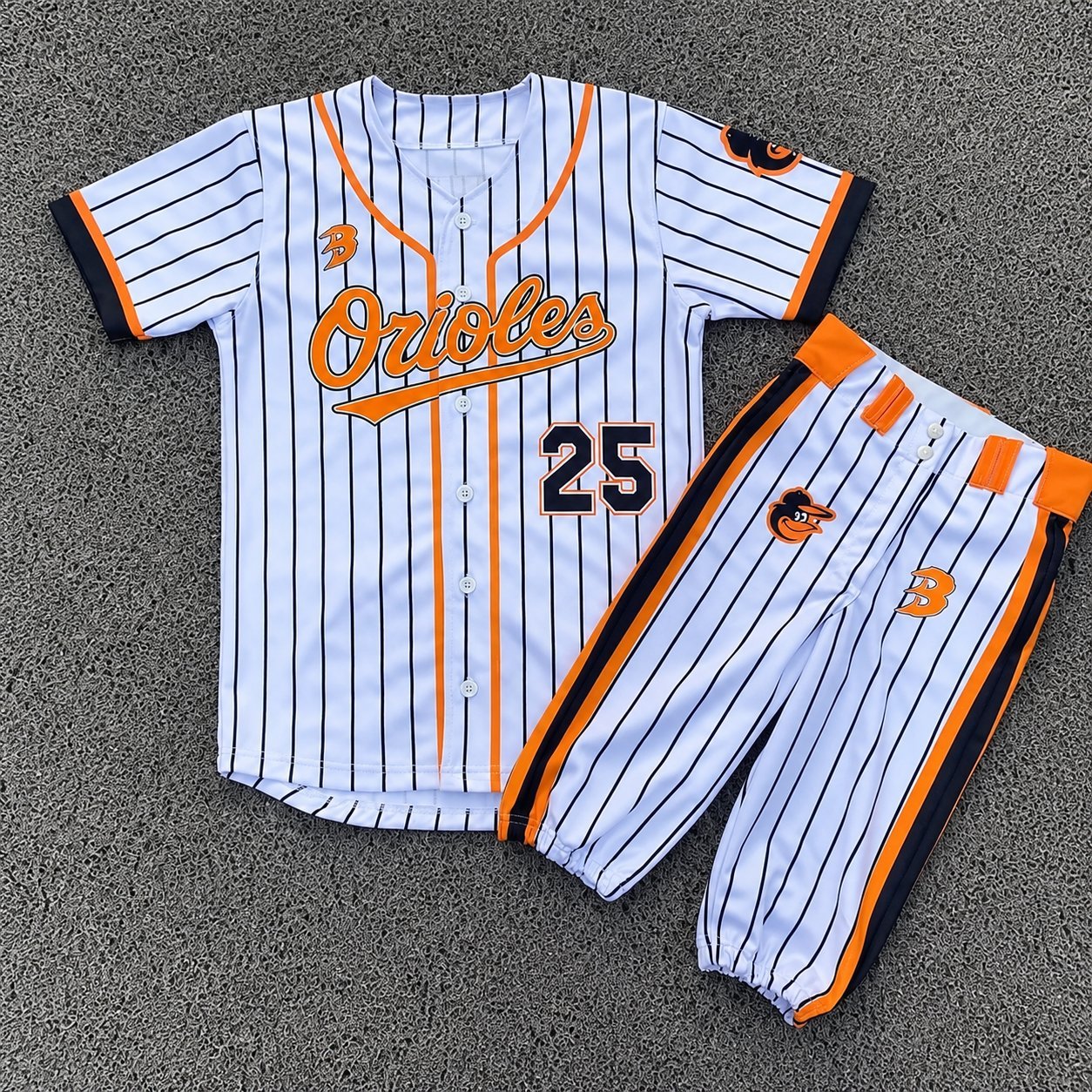 White pinstripe custom softball jersey number 25 with Orioles-style script and matching pants.