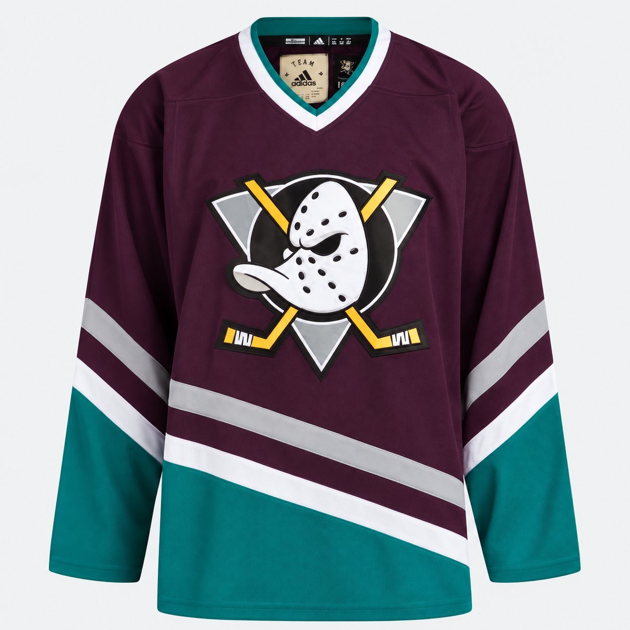 Modern Mighty Ducks of Anaheim NHL jersey in eggplant and jade with white accents and the cartoon duck mask primary logo, blank nameplate.