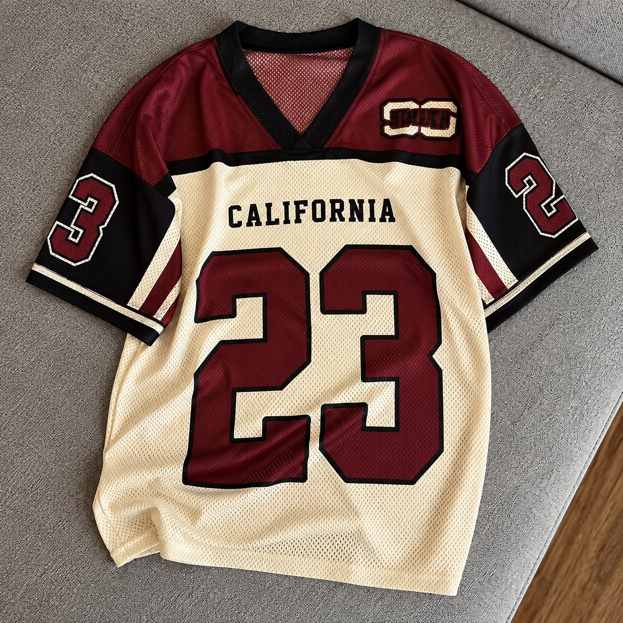 Cream and burgundy 49ers-style throwback football jersey with California 23