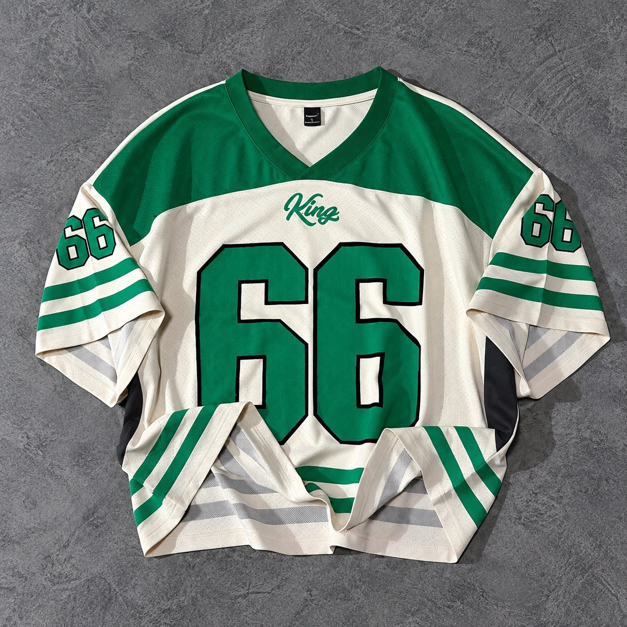 White and green Seahawks Kingdome-era throwback football jersey with number 66