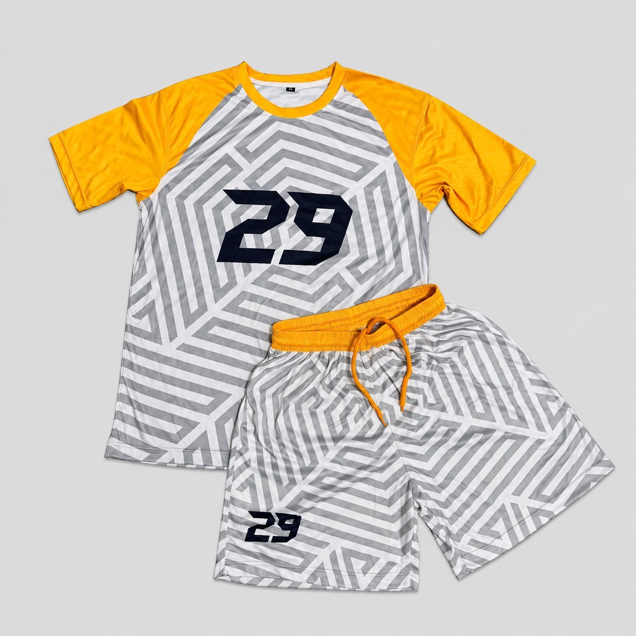 Yellow sleeve number 29 youth jersey with gray geometric maze print and matching drawstring shorts