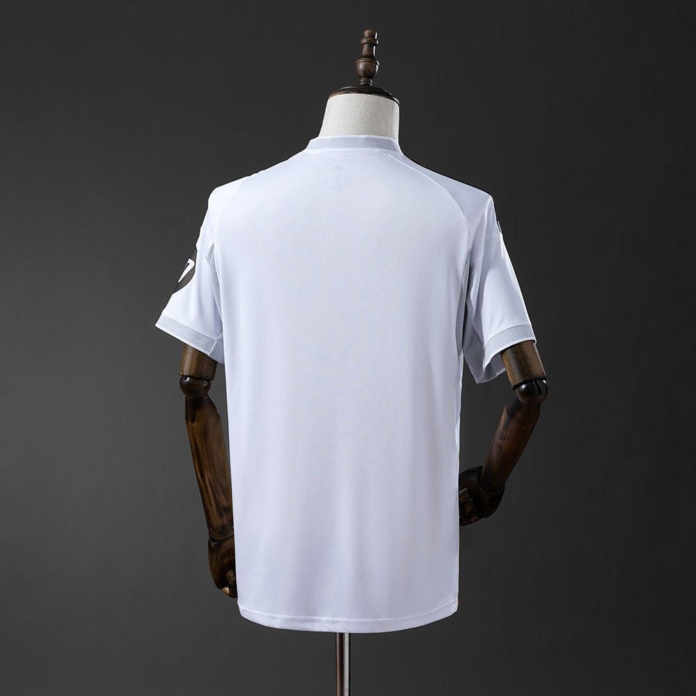2025-2026 Real Madrid Home Jersey - White with Gold and Black Shoulder Stripes — alternate view 1