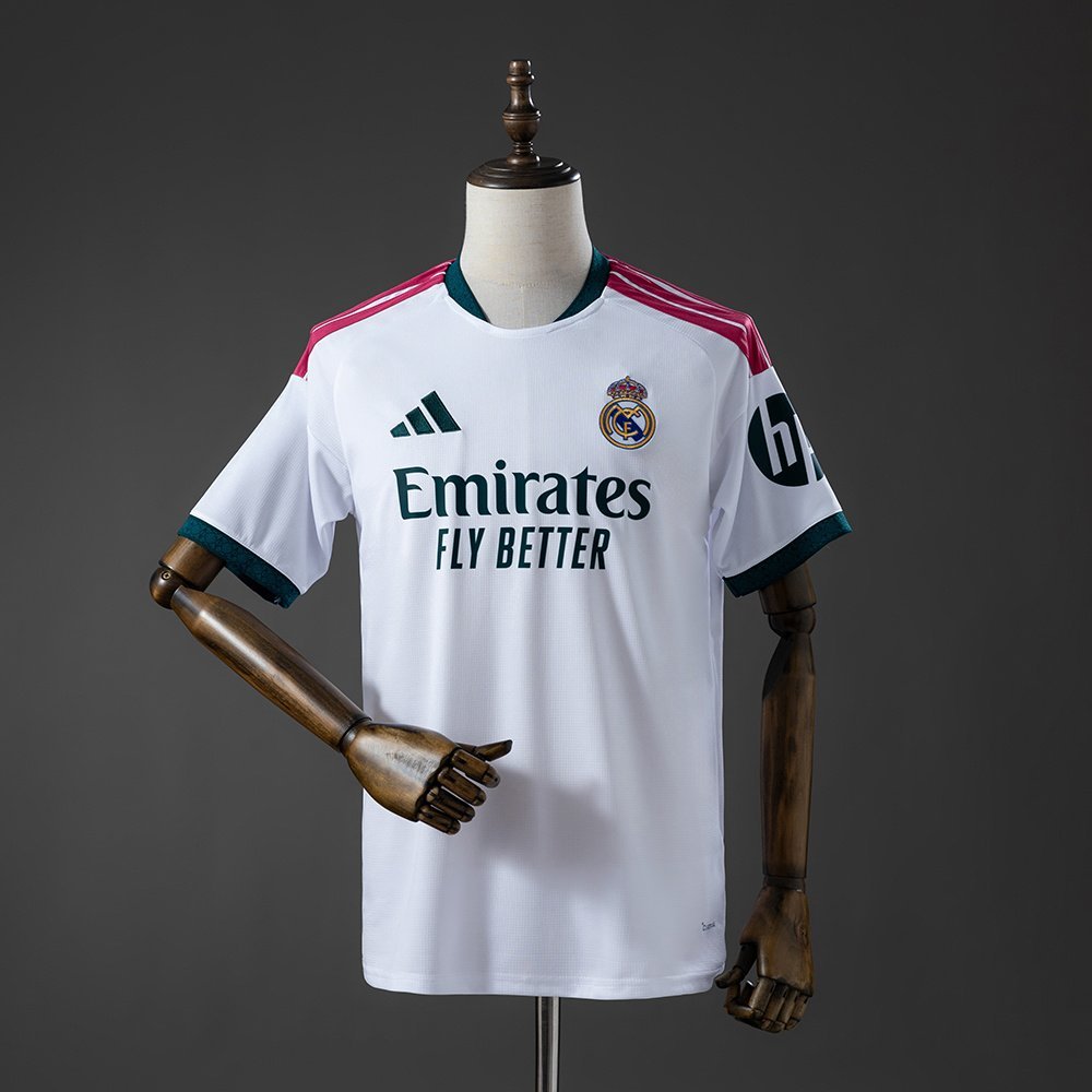2026-2027 Real Madrid Home Jersey - White with Pink Shoulder Stripes and Green Collar — product photo