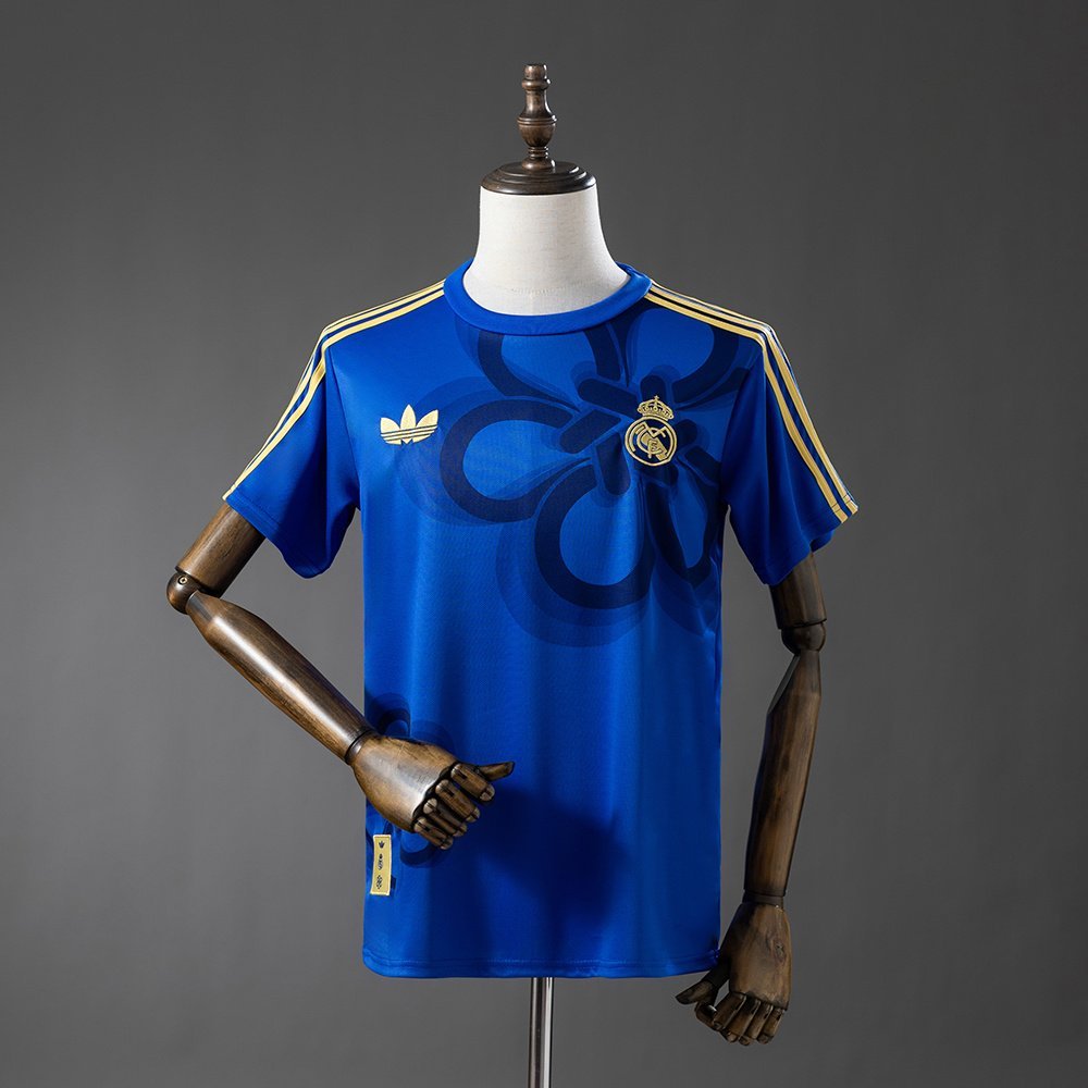 Real Madrid 2026-2027 Jersey in Blue with Gold Abstract Print — product photo