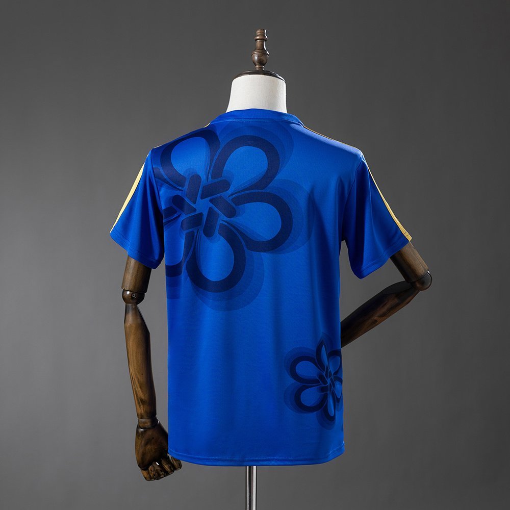 Real Madrid 2026-2027 Jersey in Blue with Gold Abstract Print — alternate view 1