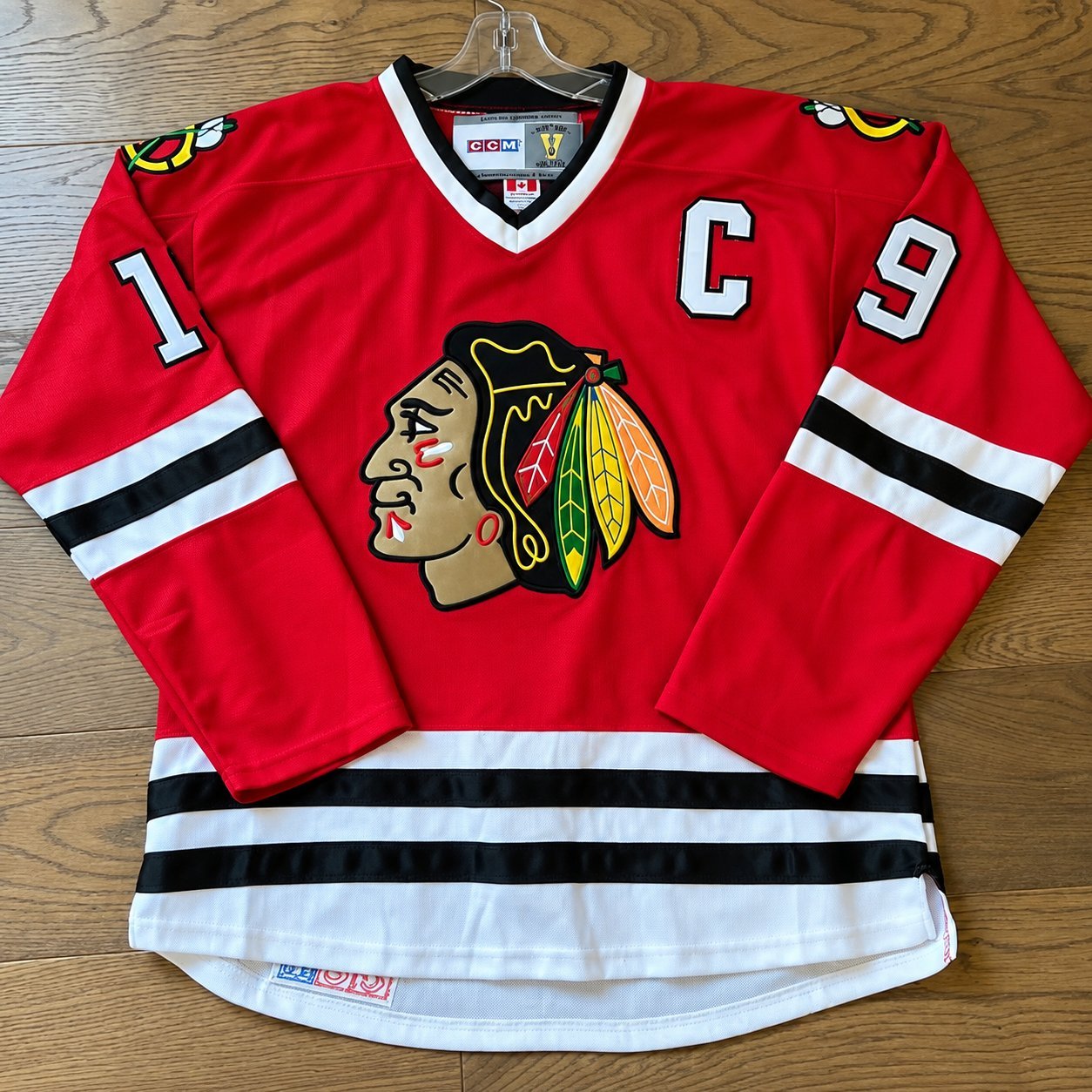 Vintage CCM-era Blackhawks jersey with C captain patch and #9