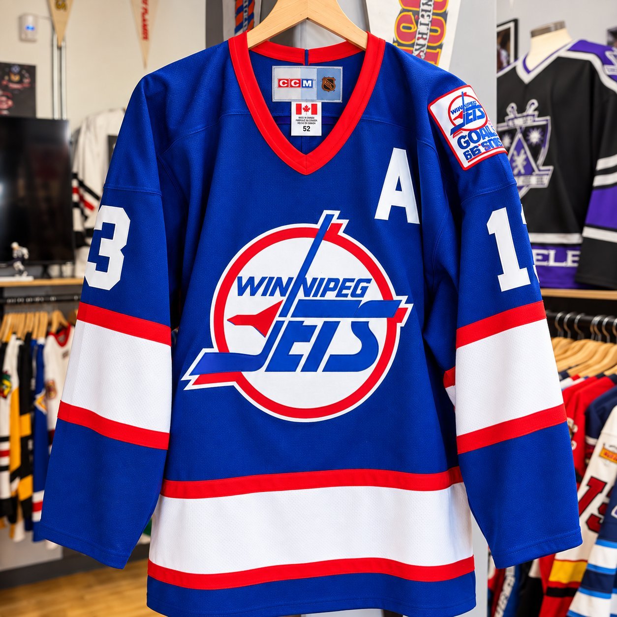 Winnipeg Jets CCM blue jersey with throwback crest